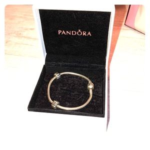 Silver pandora bracelet with 2 charm holders